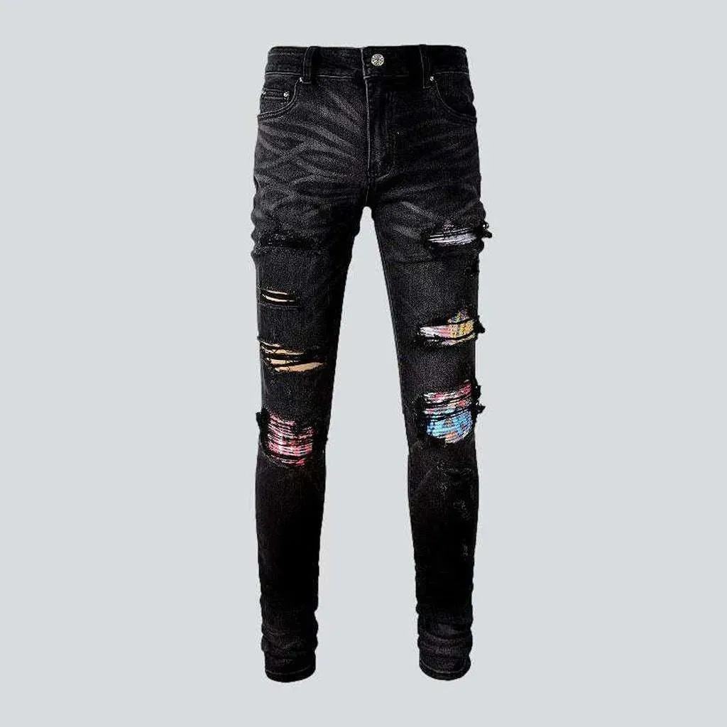 Graffiti print patchwork biker jeans