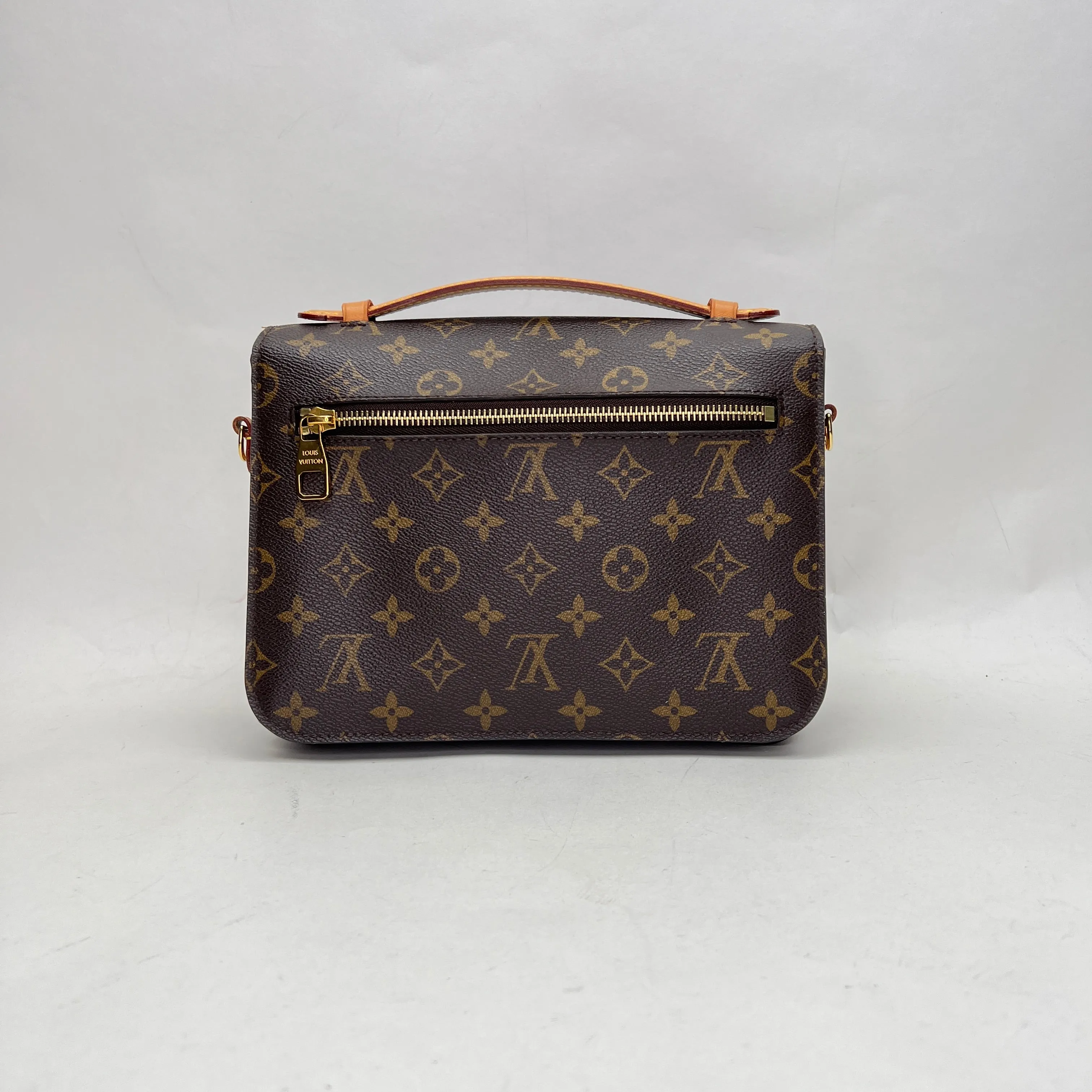 Metis Pochette Brown Crossbody Bag in Monogram Coated Canvas, Gold hardware